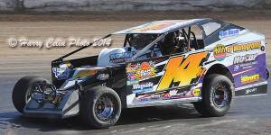 The Jeffer Jeff Heotzler navigates the tricky corners of the New York State Fairgrounds Mile