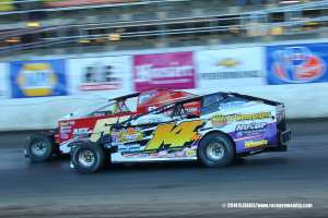 The Jeffer Jeff Heotzler races Dom Buffalino down the front stretch during the Syracuse 200
