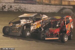Jeff Heotzler and Mike Ruggiero battle for position during the Eastern States 200 at the Orange County Fair Speedway!
